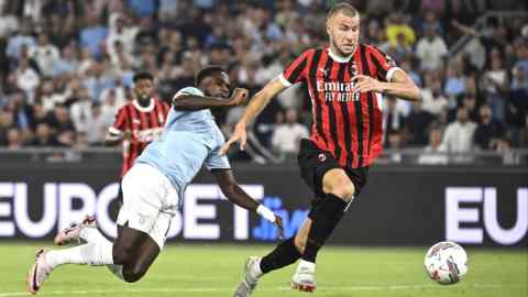 Lazio’s Boulaye Dia, left, in action against Milan’s Strahinja Pavlovic, right, during the Serie A soccer match