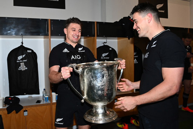 Beauden Barrett and Will Jordan of the All Blacks celebrate with the Bledisloe Cup.