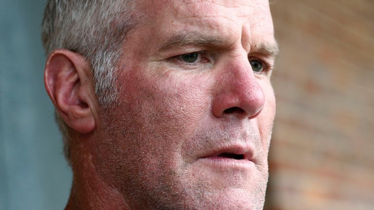 NFL Hall of Fame quarterback Brett Favre speaks with reporters about his support for Willowood Developmental Center, a facility that provides training and assistance for special needs students,