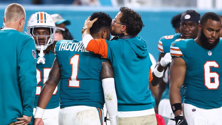 Tua Tagovailoa leaves the field after an injury against Buffalo Bills