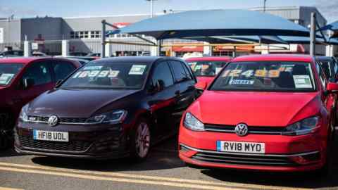 Used cars for sale on a forecourt in London