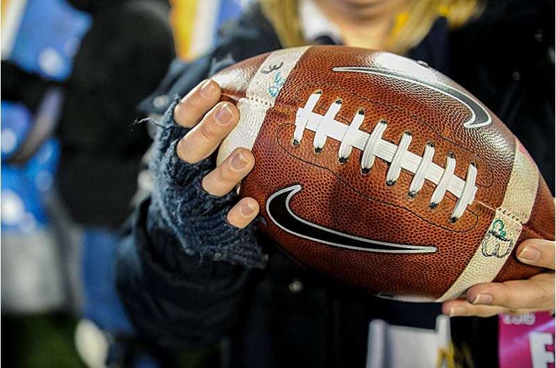 WVU researchers say colleges barred from throwing money at student-athletes are offering them multimillion-dollar coaches instead