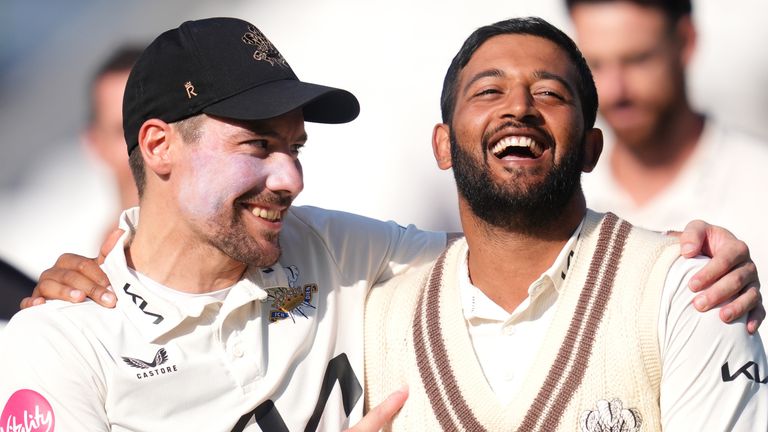 Surrey's Rory Burns (left) and Ryan Patel celebrate following victory on day three of the Vitality County Championship match at the Kia Oval, London. Picture date: Thursday September 19, 2024.
