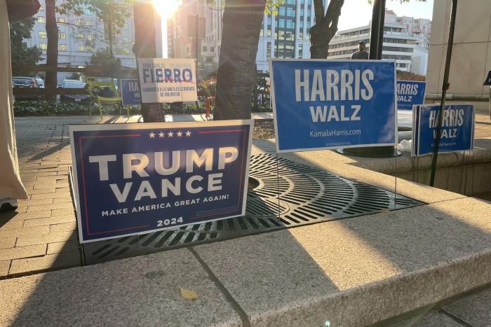 Campaign billboards outside a polling station in Arlington, Virginia, on Friday