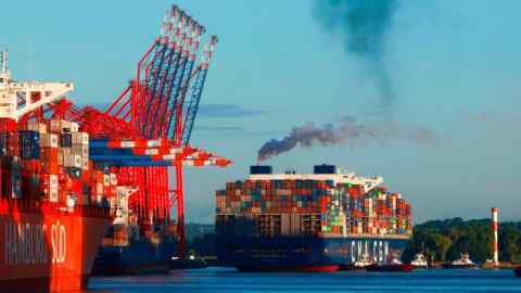 The container ship CMA CGM Zheng He (R) of the shipping company CMA CGM docks at the Eurogate container terminal in Waltershofer Hafen