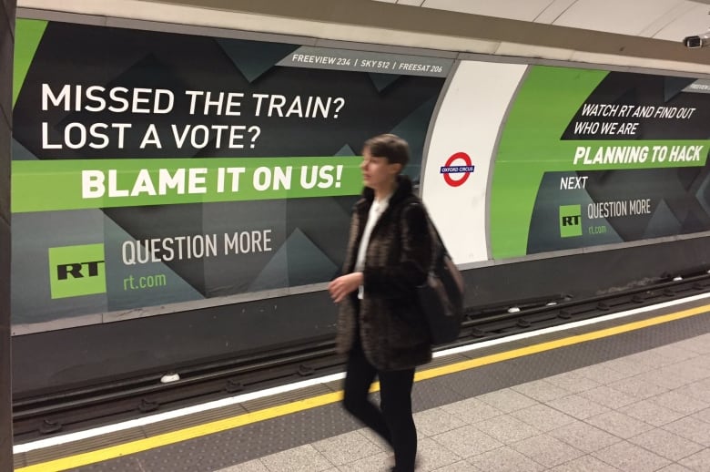 RT's slogan "Question More" on an ad on the London Underground. Western consumers of Russian propaganda are encouraged to see themselves as independent thinkers who do their own research.