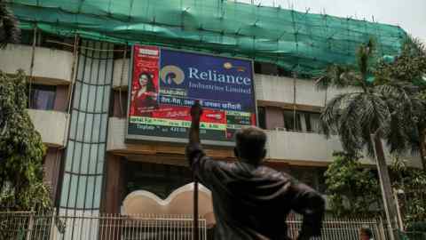 A screen in Mumbai showing stock numbers