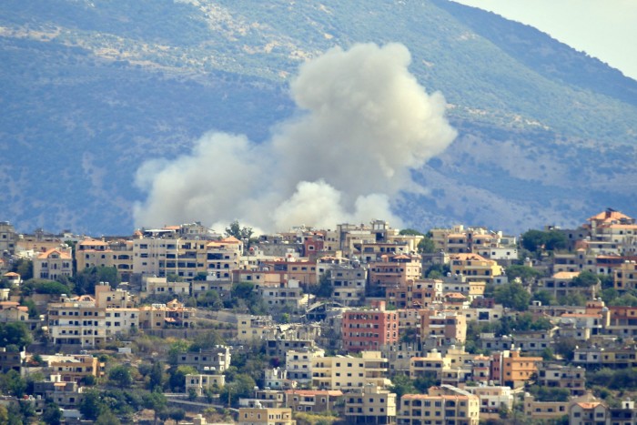 Smoke rises from the site of an Israeli air strike in the village of Khiam in southern Lebanon