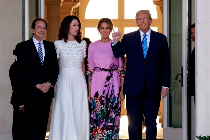 John Paulson, Alina de Almeida, Melania and Donald Trump in Palm Beach, Florida in Aprile