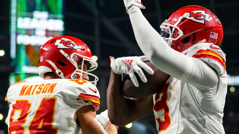 Kansas City Chiefs wide receiver JuJu Smith-Schuster (9) celebrates his touchdown with Justin Watson (84) during the second half of an NFL football game against the Atlanta Falcons, Sunday, Sept. 22, 2024, in Atlanta. (AP Photo/Brynn Anderson)