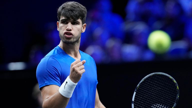 Team Europe's Carlos Alcaraz reacts during his singles tennis match against Team World's Taylor Fritz on the third day of the Laver Cup tennis tournament, at the Uber arena in Berlin, Germany, Sunday, Sept. 22, 2024. (AP Photo/Ebrahim Noroozi)