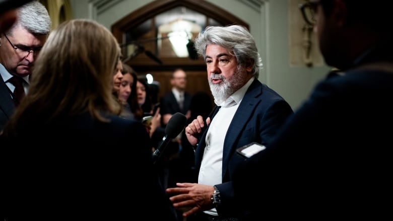 Pablo Rodriguez speaks to reporters on Parliament Hill in Ottawa