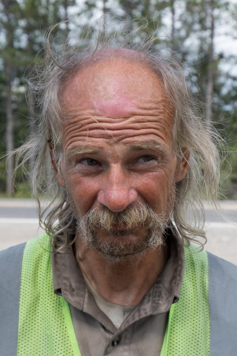 Garnet Nelson, photographed on the side of the Trans-Canada Highway by SooToday, said he was planning to canoe across Lake Huron from Manitoulin Island on his way back to London.