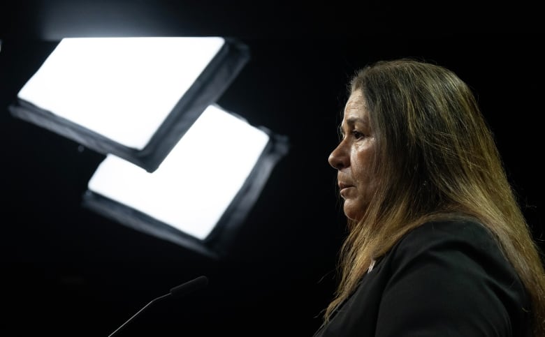 The Survivors’ Secretariat Executive Lead Laura Arndt is seen during a news conference on Parliament Hill, in Ottawa, Monday, Sept. 30, 2024.