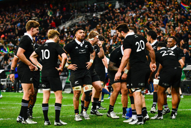 The All Blacks are dejected after a try to Malcolm Marx of the Springboks.