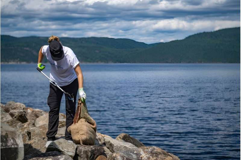 Viridiana Jimenez, a marine biologist with Reseau Quebec Maritime, collects trash near L'Anse-Saint-Jean