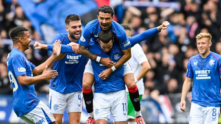 Rangers' Tom Lawrence celebrates with teammates after scoring to make it 1-0