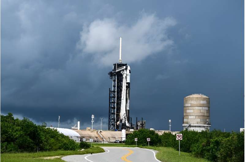 A SpaceX Falcon 9 rocket with the Crew Dragon Resilience capsule sits on Launch Complex 39A at Kennedy Space Center ahead of the Polaris Dawn Mission in Cape Canaveral, Florida