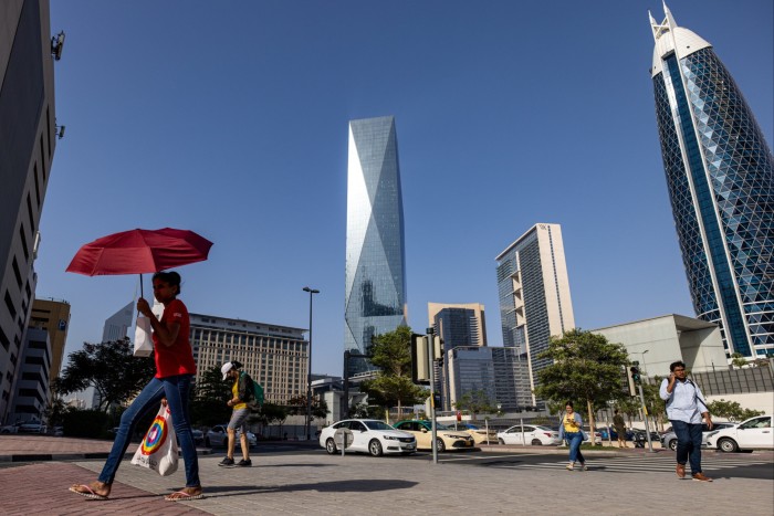 Pedestrians in Dubai’s financial district