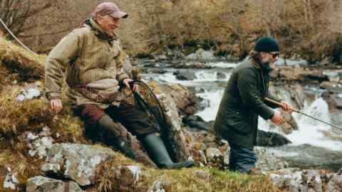 The author fishing on the River Carron with Jim the ghillie