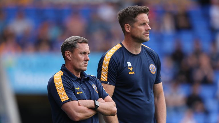 Paul Hurst the head coach of Shrewsbury Town and Chris Doig the assistant head coach of Shrewsbury Town during the pre-season friendly match between Shrewsbury Town and Leicester City at Croud Meadow on July 23, 2024 in Shrewsbury, England.