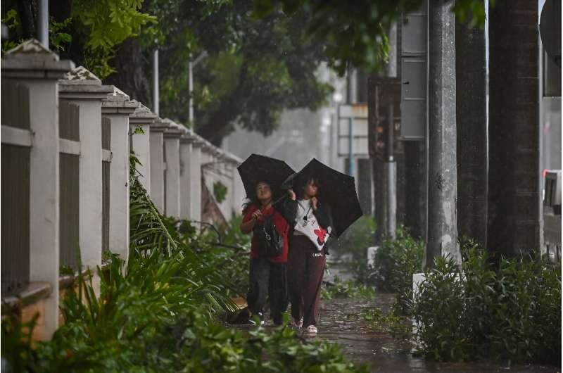 Tropical Storm Yagi slammed into the main island of Luzon after brushing past the Bicol region southeast of Manila, with more heavy rain forecast