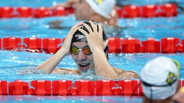 Nicholas Bennett swims to Canada’s 1st gold at Paris Paralympics in SB14 100m breaststroke