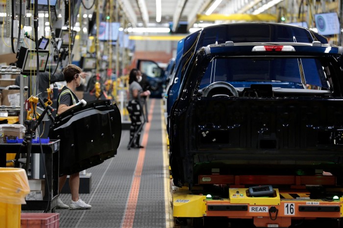 Workers on the Ford production line in Michigan