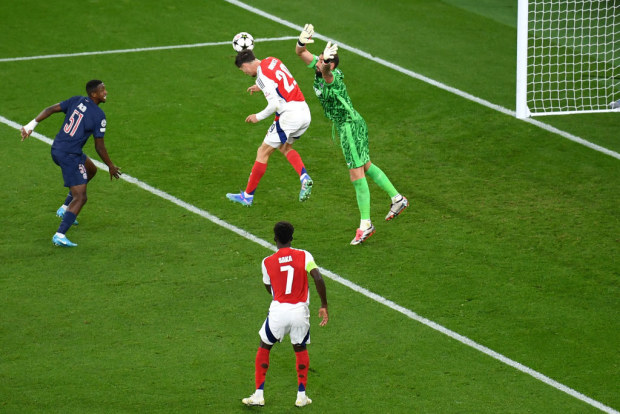 Kai Havertz of Arsenal scores past Gianluigi Donnarumma of PSG.