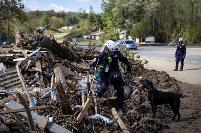 Rescue workers search for missing people in Burnsville, North Carolina 