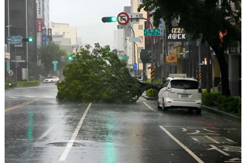 Torrential rain and powerful winds unleashed on the island have already left at least two people dead, two missing and 123 injured