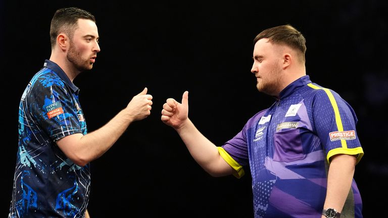 Luke Humphries (left) and Luke Littler during the final during the 2024 BetMGM Premier League play-off at The O2, London. Picture date: Thursday May 23, 2024.