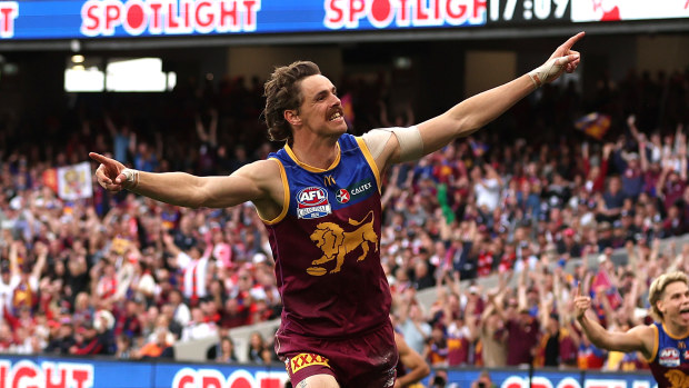 Joe Daniher of the Lions celebrates after scoring a goal.