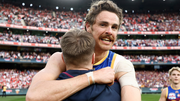 Lincoln McCarthy (left) and Joe Daniher of the Lions celebrate during the 2024 AFL Grand Final match between the Sydney Swans and the Brisbane Lions at The Melbourne Cricket Ground on September 28, 2024 in Melbourne, Australia. (Photo by Michael Willson/AFL Photos via Getty Images)