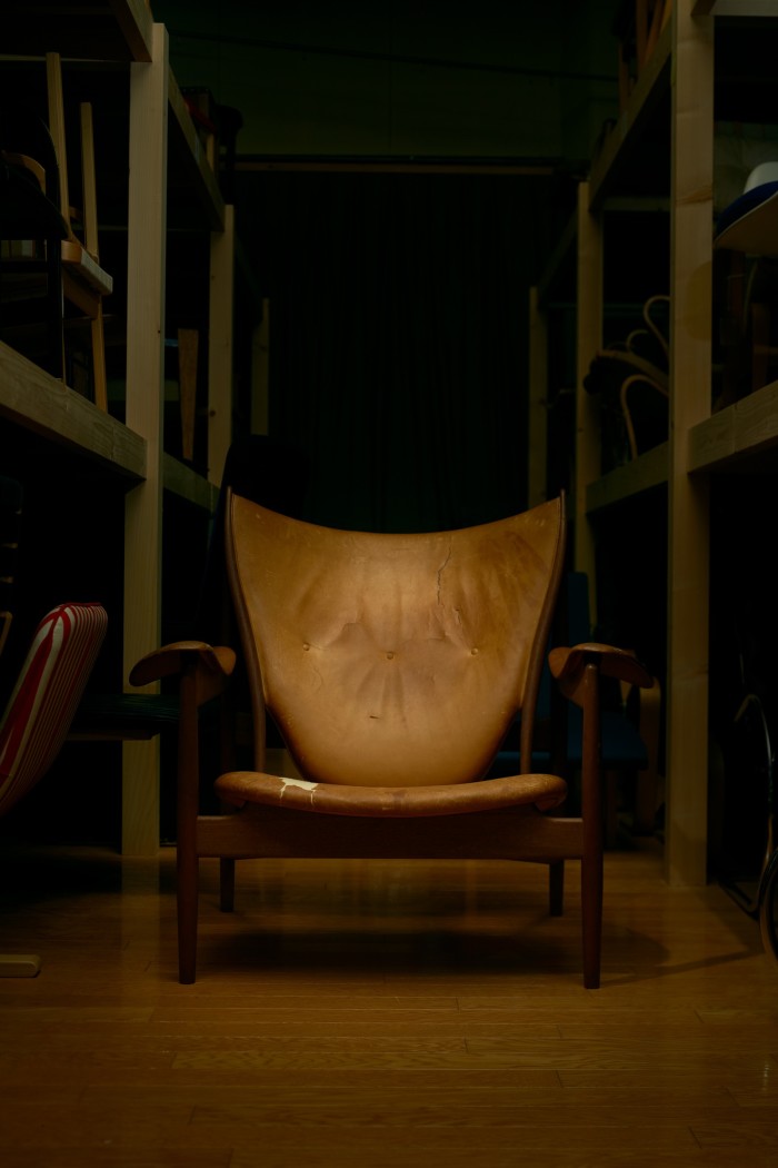 A Finn Juhl Chieftain chair kept by Oda in storage