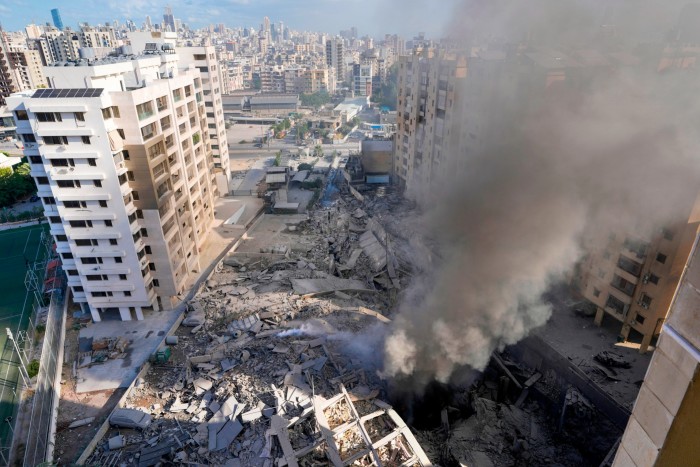 Smoke rises from the site of an Israeli airstrike in Dahiyeh, Beirut