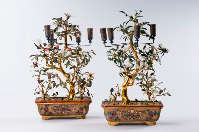 Two bejewelled, highly decorated rectangular vases which, instead of containing actual flowers, contain artificial plants with branches made from gold, silver and copper, and flowers made from  precious stones and metals