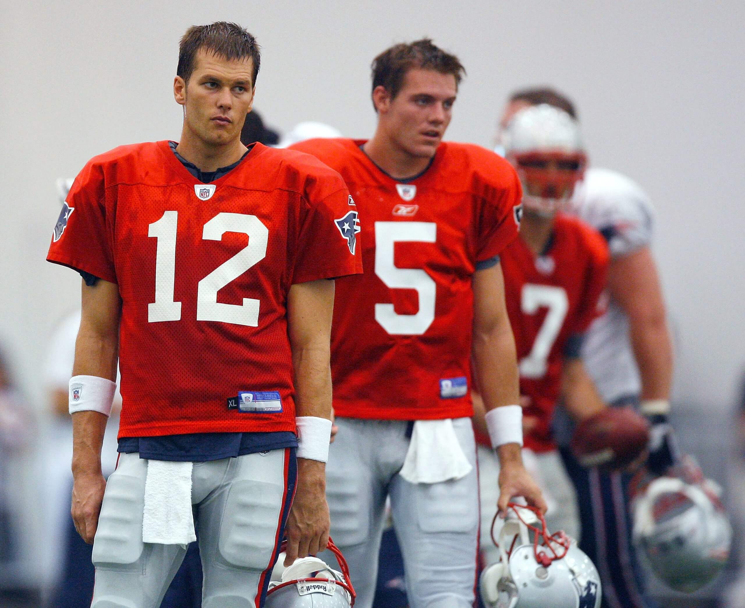 Quarterback Tom Brady and Kevin O'Connell of the New England Patriots participate in a drill during the first day of training camp at Gillette Stadium on July 24, 2008 in Foxboro, Massachusetts.