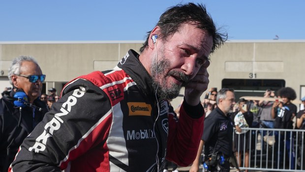 Keanu Reeves drives during the GR Cup Series auto race at Indianapolis Motor Speedway, Saturday, Oct. 5, 2024, in Indianapolis. (AP Photo/Darron Cummings)