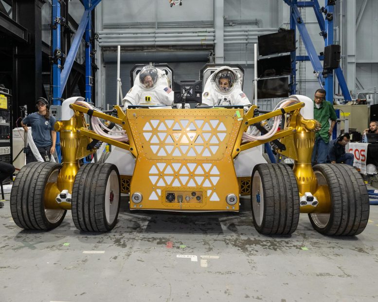 Suited NASA Engineers Rover Prototype