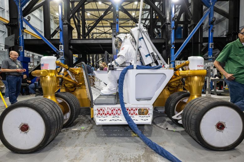 Suited NASA Engineers Rover Prototype Testing