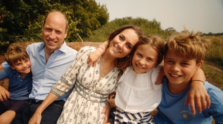 A family of five is seen in a photo.