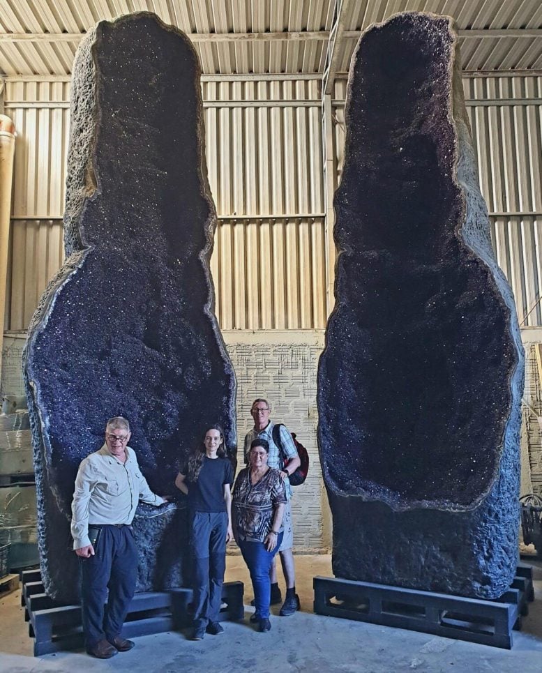 Researchers and Giant Amethyst Geode in Uruguay