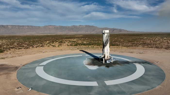 Blue Origin’s New Shepard rocket booster on the pad after returning to earth following a launch