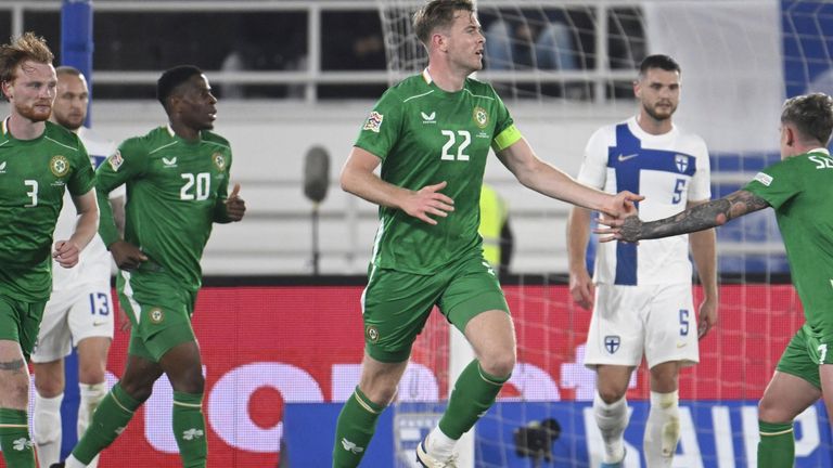 Ireland's Liam Scales, left, celebrates scoring with teammates Chiedozie Ogbene, 2nd left, Nathan Collins, center, and Sammie Szmodics, right, during the UEFA Nations League soccer match between Finland and Republic of Ireland at the Olympic Stadium in Helsinki, Finland, Thursday Oct. 10, 2024.