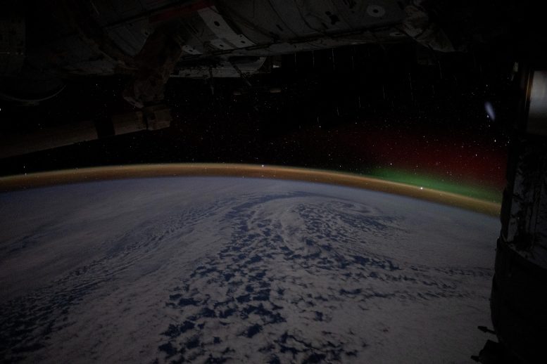 Wispy Aurora Australis Rises Above Earth’s Airglow