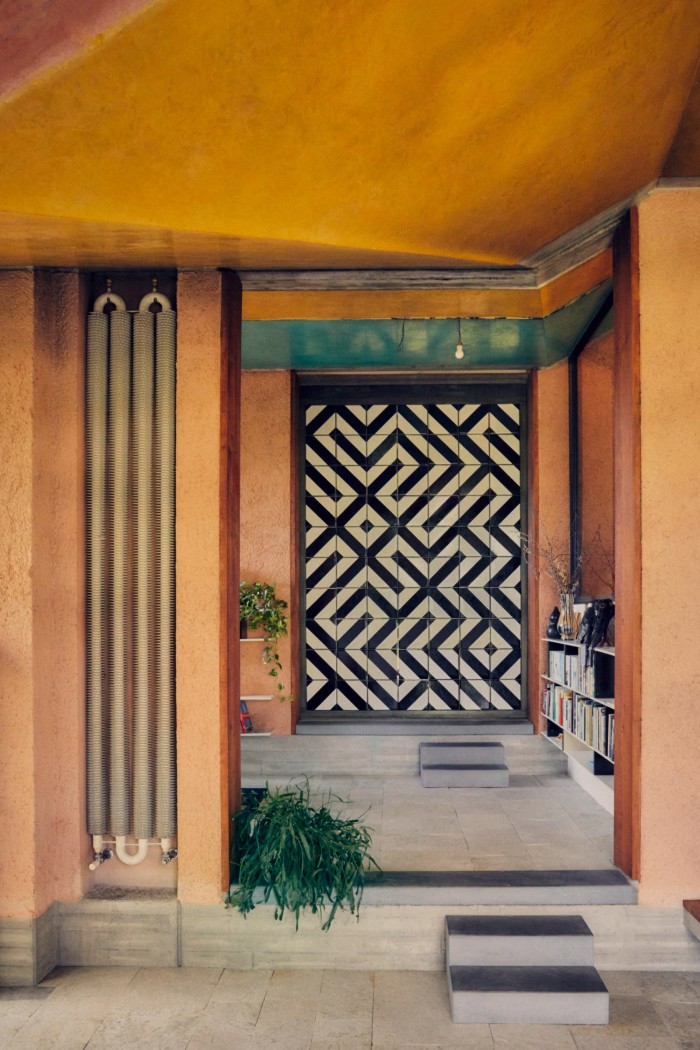 Looking through to Casa Tabarelli’s study, with its kinetic walls made of rotating panels