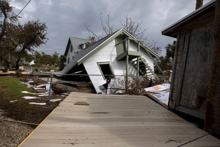 A destroyed house after Hurricane Milton made landfall in Englewood, Florida