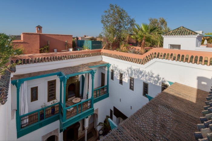 A balcony overlooking the courtyard at Le Farnatchi in Marrakech