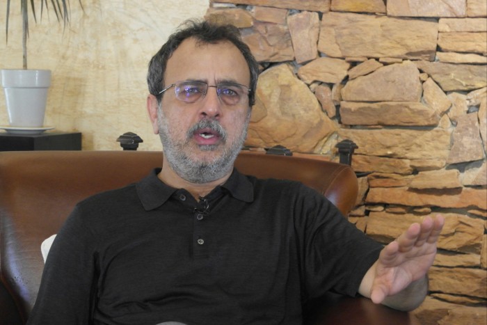 Power minister Awais Leghari gestures during an interview in July